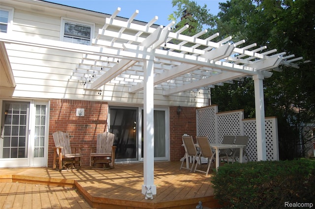 6560 Perham Dr, West Bloomfield, MI 48322 - wooden deck featuring a pergola and outdoor dining area