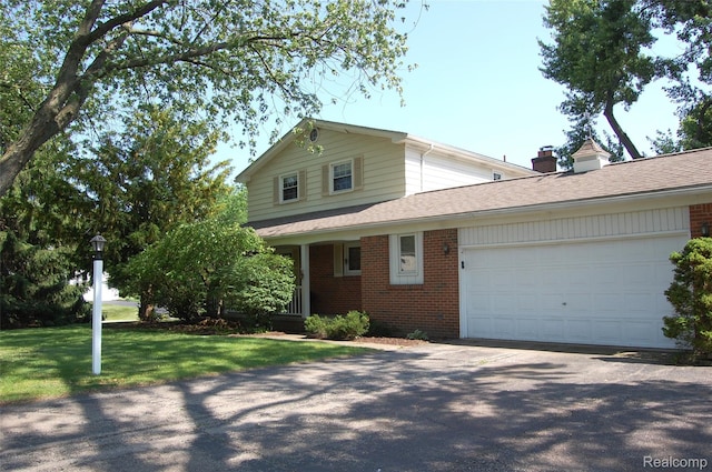 6560 Perham Dr, West Bloomfield, MI 48322 - traditional home featuring brick siding, a garage, driveway, and a front yard