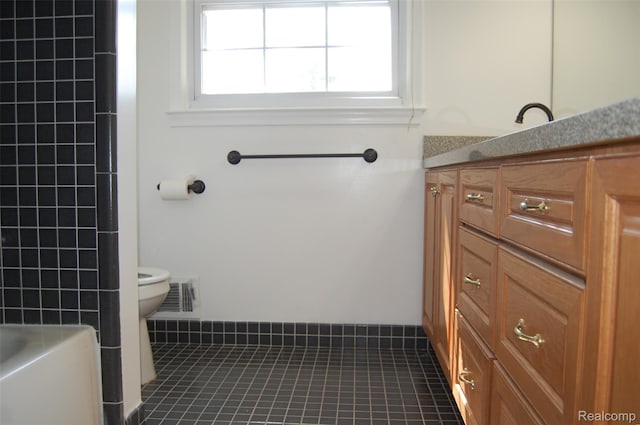 6560 Perham Dr, West Bloomfield, MI 48322 - bathroom with vanity and tile patterned flooring