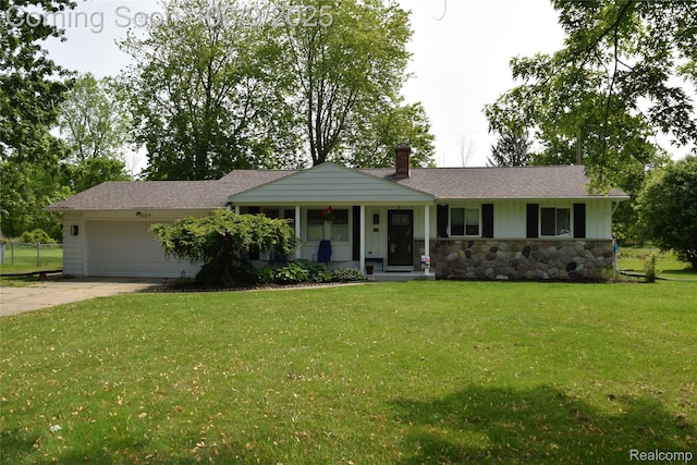 6009 Lancaster Dr, Flint, MI 48532 - ranch-style house with stone siding, a front yard, a garage, driveway, and a porch