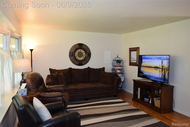 6009 Lancaster Dr, Flint, MI 48532 - living area featuring wood finished floors and baseboards