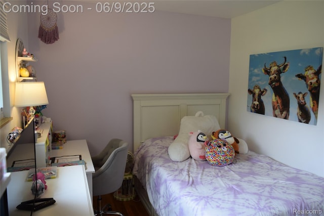 6009 Lancaster Dr, Flint, MI 48532 - bedroom with wood finished floors