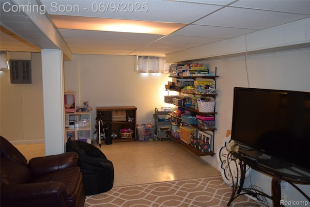 6009 Lancaster Dr, Flint, MI 48532 - finished below grade area with tile patterned floors and a drop ceiling