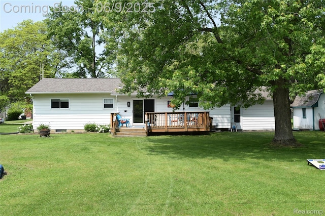 6009 Lancaster Dr, Flint, MI 48532 - rear view of property with a wooden deck and a yard