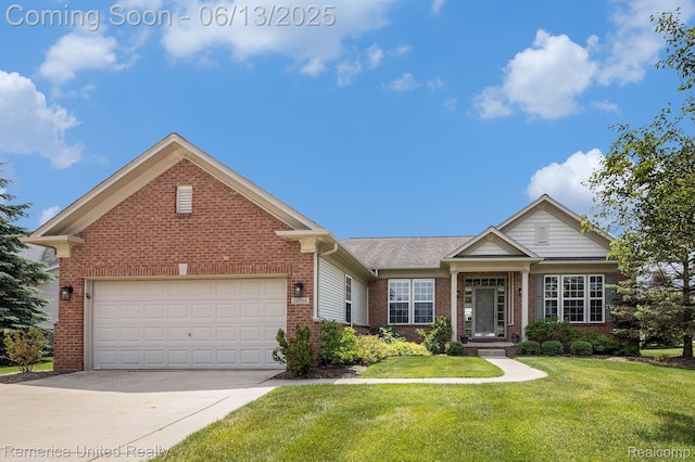 24168 Grand Traverse Ave, Flat Rock, MI 48134 - view of front facade featuring brick siding, concrete driveway, a front yard, and a garage