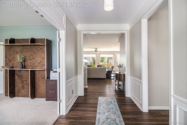 24168 Grand Traverse Ave, Flat Rock, MI 48134 - hall with dark wood-style flooring, a wainscoted wall, a decorative wall, and crown molding