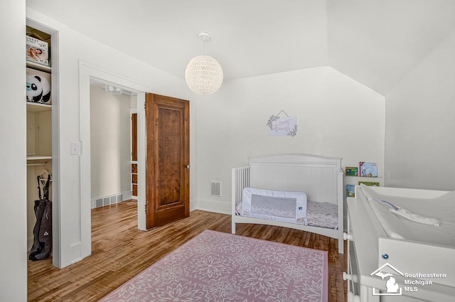 448 Borgess Ave, Monroe, MI 48162 - bedroom featuring wood finished floors and baseboards