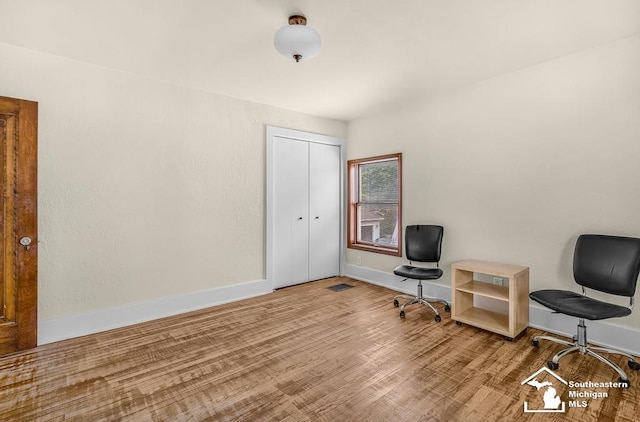 448 Borgess Ave, Monroe, MI 48162 - living area featuring wood finished floors and baseboards