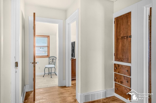 448 Borgess Ave, Monroe, MI 48162 - hall with light wood-type flooring and baseboards