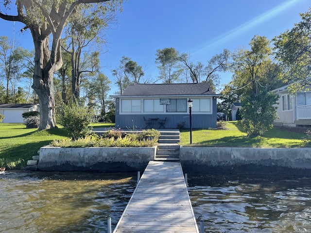 824 N Werners Landing Dr, Bronson, MI 49028 - dock area featuring a lawn