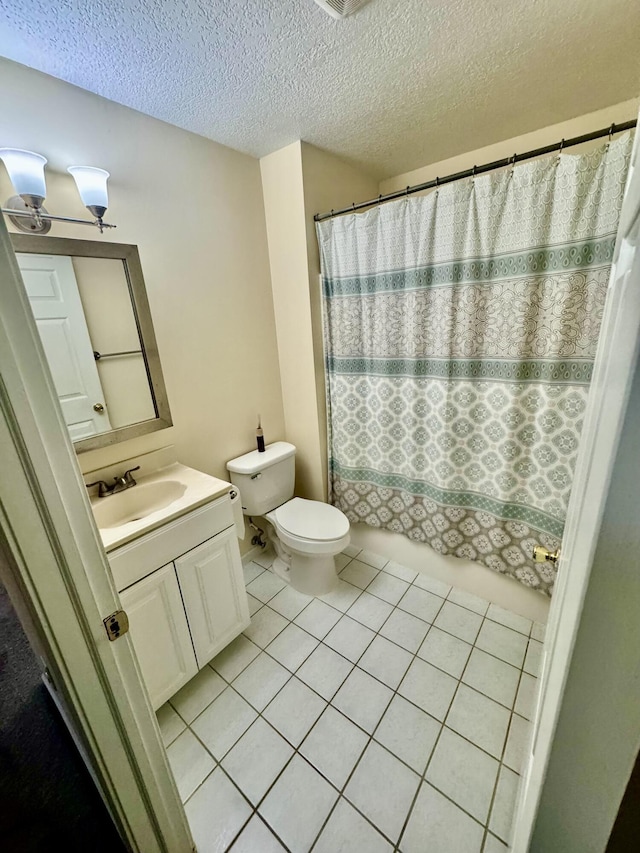 15338 Flanders St, Southgate, MI 48195 - bathroom featuring toilet, a textured ceiling, vanity, and tile patterned flooring