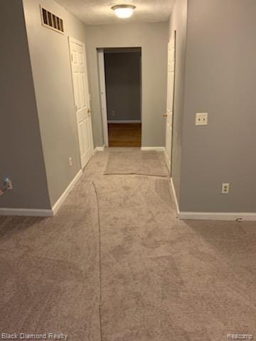 18499 Gruebner St, Detroit, MI 48234 - corridor with carpet flooring and baseboards