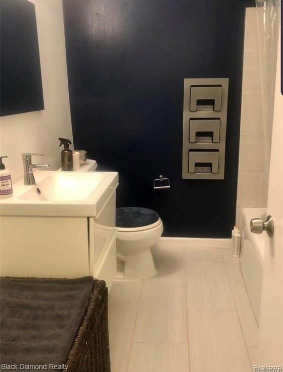 18499 Gruebner St, Detroit, MI 48234 - full bathroom featuring vanity, tile patterned floors, and a shower with shower curtain