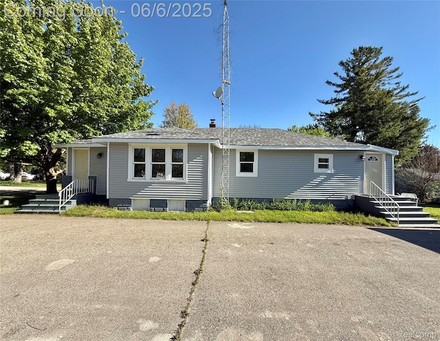 2105 Eberly Rd, Flint, MI 48532 - view of front of house with roof with shingles