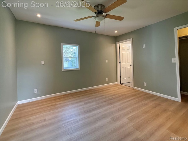 2105 Eberly Rd, Flint, MI 48532 - unfurnished bedroom featuring light wood-style flooring, recessed lighting, baseboards, a walk in closet, and ceiling fan