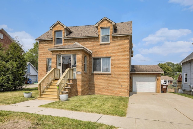 525 Riverview Ave, Monroe, MI 48162 - view of front facade featuring a front lawn and brick siding