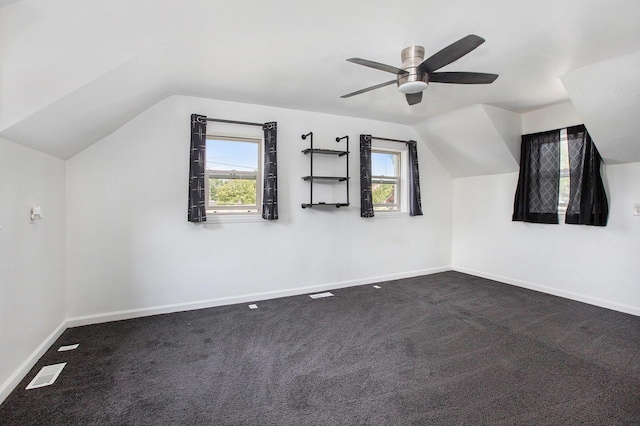 525 Riverview Ave, Monroe, MI 48162 - bonus room with vaulted ceiling, a ceiling fan, baseboards, and dark colored carpet