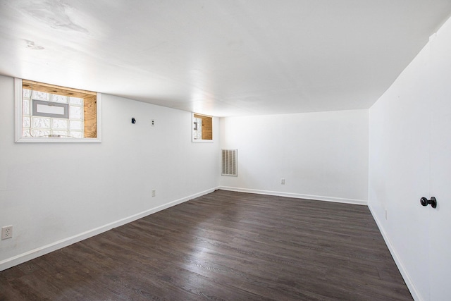 525 Riverview Ave, Monroe, MI 48162 - spare room with dark wood-style flooring and baseboards