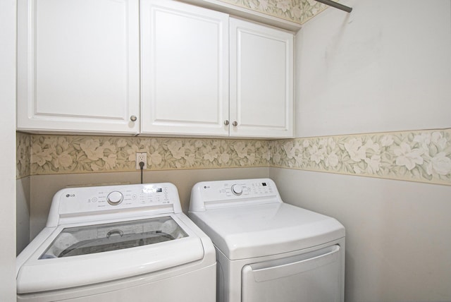 743 Fieldview Dr, Grand Ledge, MI 48837 - laundry room featuring washer and dryer and cabinet space