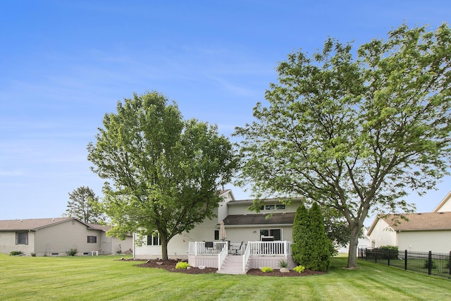 743 Fieldview Dr, Grand Ledge, MI 48837 - rear view of house with a wooden deck