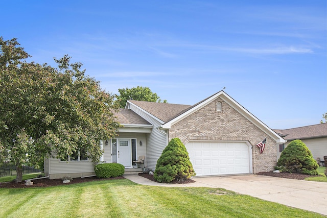 743 Fieldview Dr, Grand Ledge, MI 48837 - view of front of property featuring an attached garage, concrete driveway, brick siding, and roof with shingles