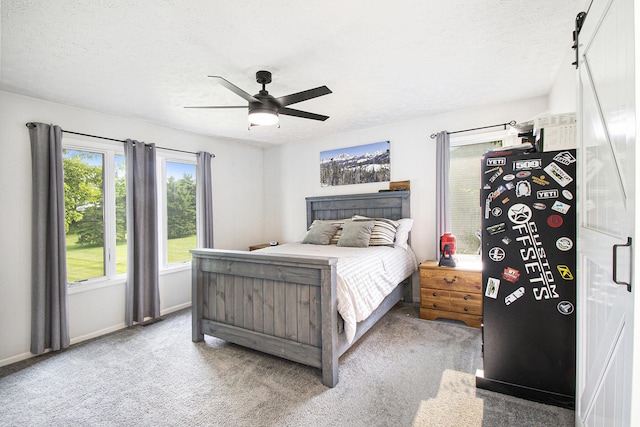 743 Fieldview Dr, Grand Ledge, MI 48837 - bedroom featuring carpet floors, a ceiling fan, baseboards, and a textured ceiling