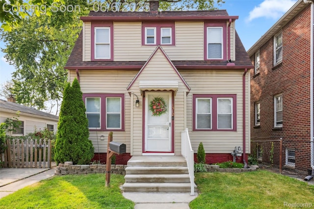 1512 Marion Ave, Lincoln Park, MI 48146 - view of front facade with a shingled roof and a chimney