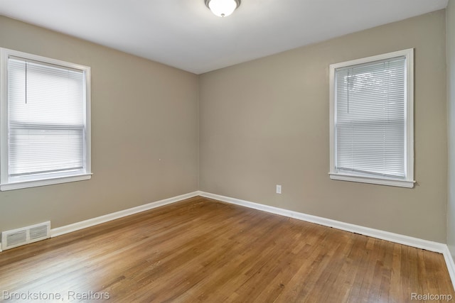 11727 Virgil, Redford, MI 48239 - unfurnished room with baseboards and wood-type flooring
