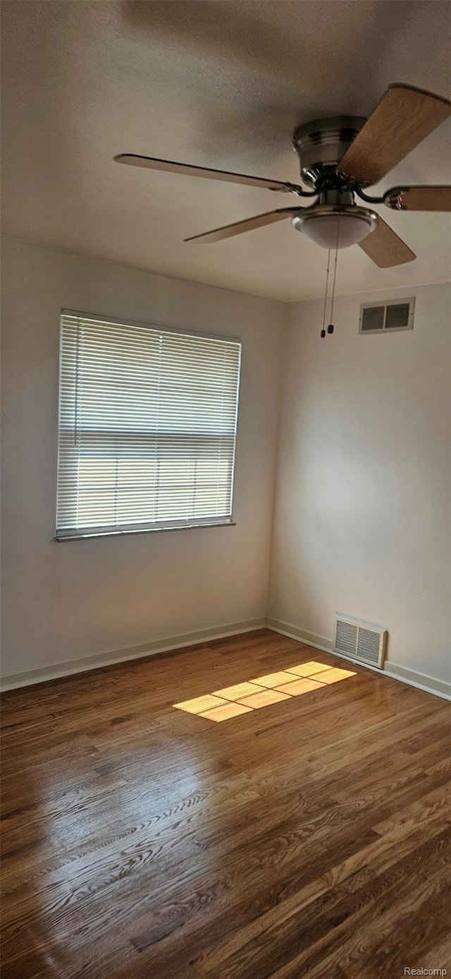 18966 Mendota St, Detroit, MI 48221 - empty room with ceiling fan and wood finished floors