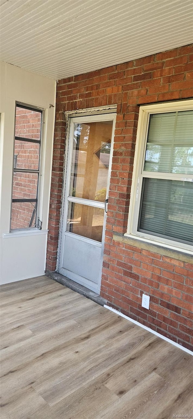 18966 Mendota St, Detroit, MI 48221 - doorway to property with brick siding