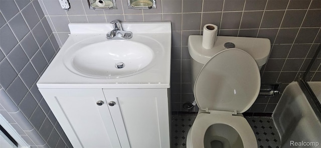 18966 Mendota St, Detroit, MI 48221 - full bath with tile walls, vanity, and a tub to relax in