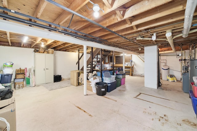 819 Elm St, Manistee, MI 49660 - unfinished basement with stairs