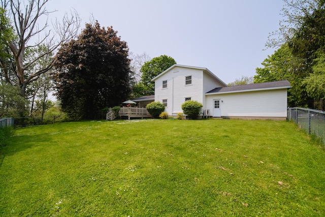 819 Elm St, Manistee, MI 49660 - view of yard with a deck