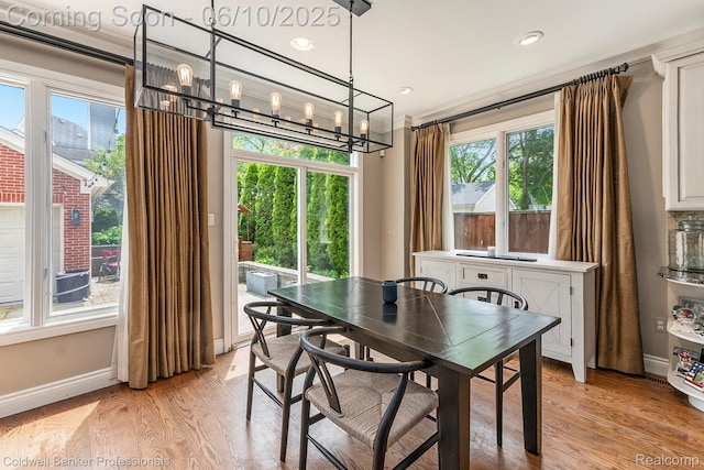 742 Emmons Ave, Birmingham, MI 48009 - dining room featuring a chandelier, baseboards, light wood-style floors, and recessed lighting