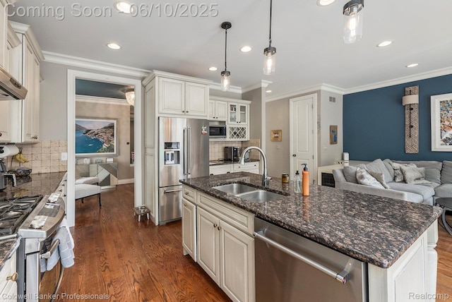 742 Emmons Ave, Birmingham, MI 48009 - kitchen featuring appliances with stainless steel finishes, a sink, ornamental molding, recessed lighting, and decorative backsplash