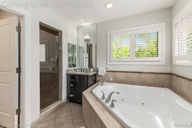 742 Emmons Ave, Birmingham, MI 48009 - full bathroom featuring a shower stall, vanity, a whirlpool tub, and tile patterned floors