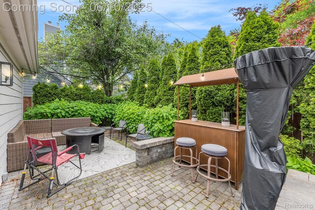 742 Emmons Ave, Birmingham, MI 48009 - view of patio featuring an outdoor fire pit