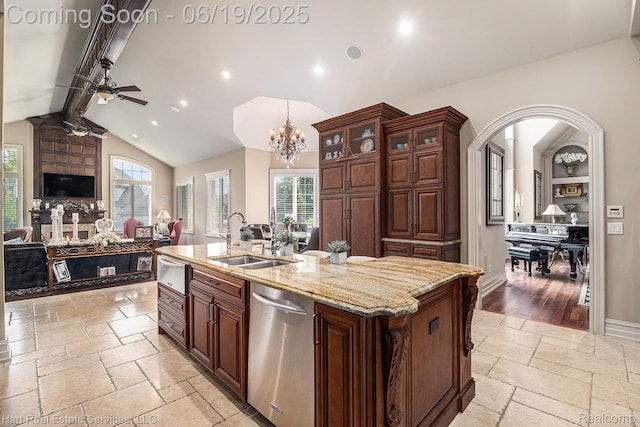 11384 Scarborough Dr, Shelby Twp, MI 48315 - kitchen featuring dishwasher, stone tile floors, a ceiling fan, open floor plan, and an island with sink