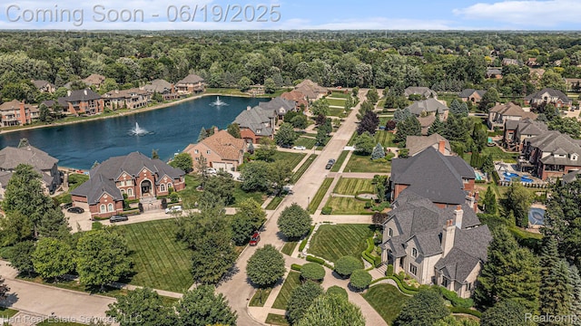 11384 Scarborough Dr, Shelby Twp, MI 48315 - aerial overview of property's location with nearby suburban area and a large body of water