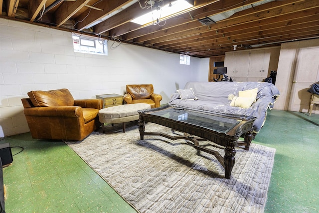 4680 Pinehaven Dr, Saginaw, MI 48638 - living room with tile patterned floors and concrete block wall