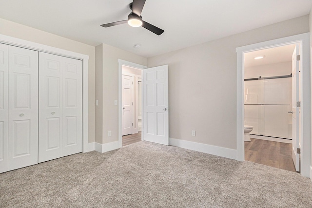 2051 Russell Rd, Muskegon, MI 49445 - unfurnished bedroom featuring carpet, a closet, ensuite bathroom, and baseboards