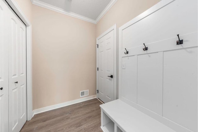 5928 Boxthorn Trl, Kalamazoo, MI 49009 - mudroom featuring ornamental molding, wood finished floors, and baseboards