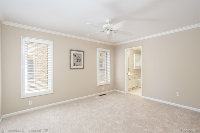 45330 Stonehedge Dr Unit 2, Plymouth, MI 48170 - unfurnished bedroom with ornamental molding, multiple windows, light carpet, connected bathroom, and ceiling fan