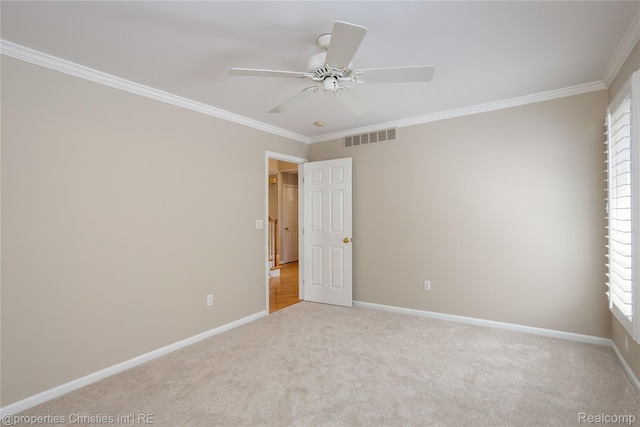 45330 Stonehedge Dr Unit 2, Plymouth, MI 48170 - spare room with ornamental molding, carpet, and a ceiling fan