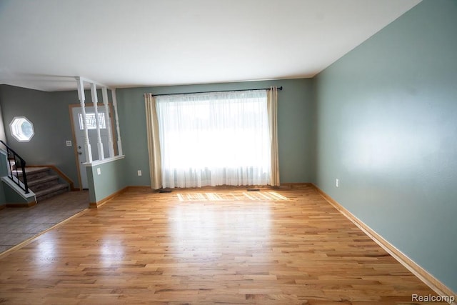 15065 Westlake St, Taylor, MI 48180 - unfurnished room with wood finished floors and stairs