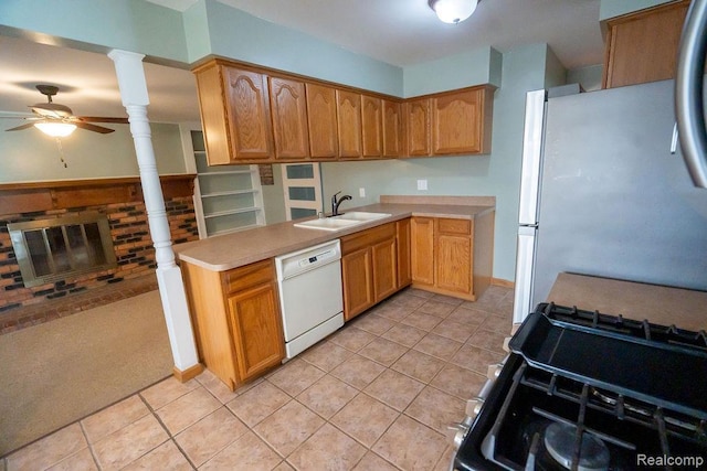 15065 Westlake St, Taylor, MI 48180 - kitchen featuring white dishwasher, gas stove, ceiling fan, light countertops, and light tile patterned flooring