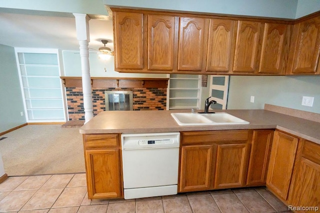 15065 Westlake St, Taylor, MI 48180 - kitchen featuring white dishwasher, light countertops, a peninsula, and brown cabinets