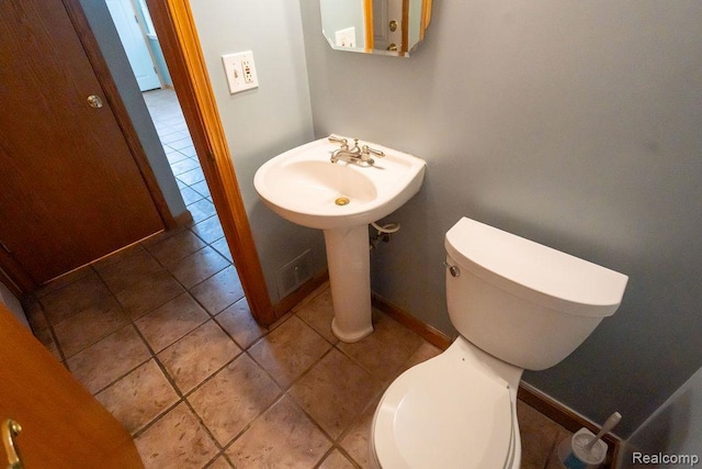 15065 Westlake St, Taylor, MI 48180 - half bath featuring toilet and tile patterned floors
