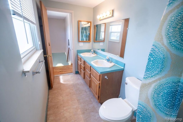 15065 Westlake St, Taylor, MI 48180 - full bathroom with double vanity and tile patterned flooring