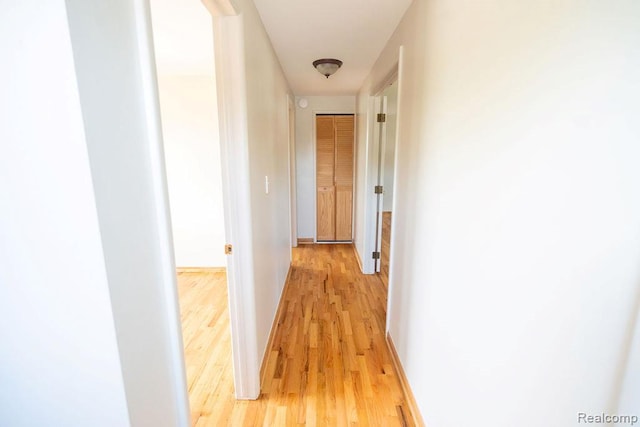 15065 Westlake St, Taylor, MI 48180 - corridor featuring light wood-style flooring and baseboards